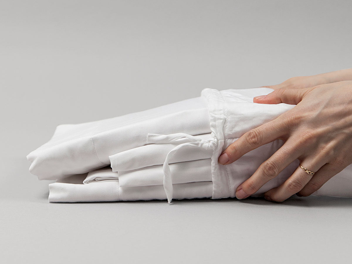 Juego de sábanas blancas Nan